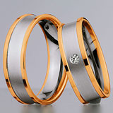 Marrying 585 Weiss-Rotgold, 6,50 mm Breite, seidenmatt / poliert, 1 Brillant 0,07 ct W/SI,