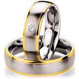 Los anillos de boda Edelstahl/ 585 Gelbgold, 6,00 mm Breite, seidenmatt / poliert, 1 Brillant 0,03 ct. W/SI,