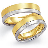 Marrying 585 Weiss / Gelbgold, 6,0 mm Breite, seidenmatt / poliert, 1 Brillant 0,04 ct TW/SI,